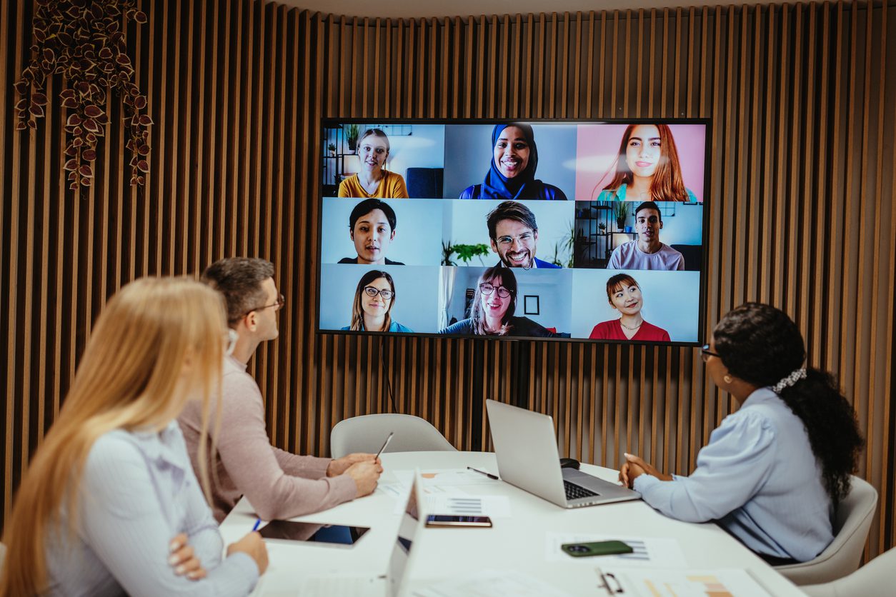 Business meeting in office with multiracial group of business people, global business with diverse people on video call